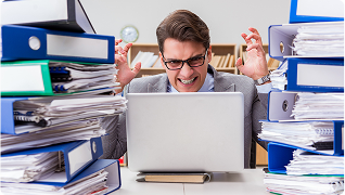 Man overwhelmed with paperwork